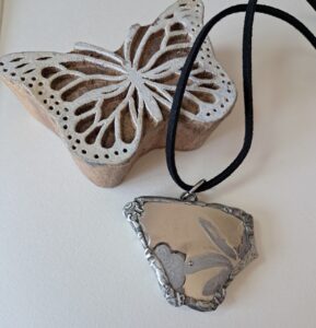 Silver pottery pendant